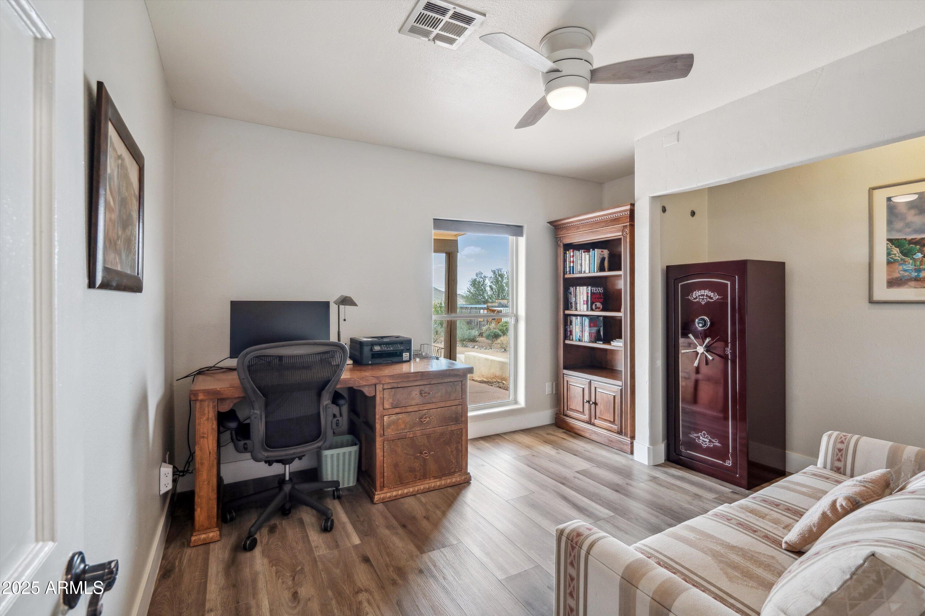 7080 East Arroyo Road Cave Creek, AZ 85331 - Photo 29 of 50 a view of a livingroom with workspace and a window