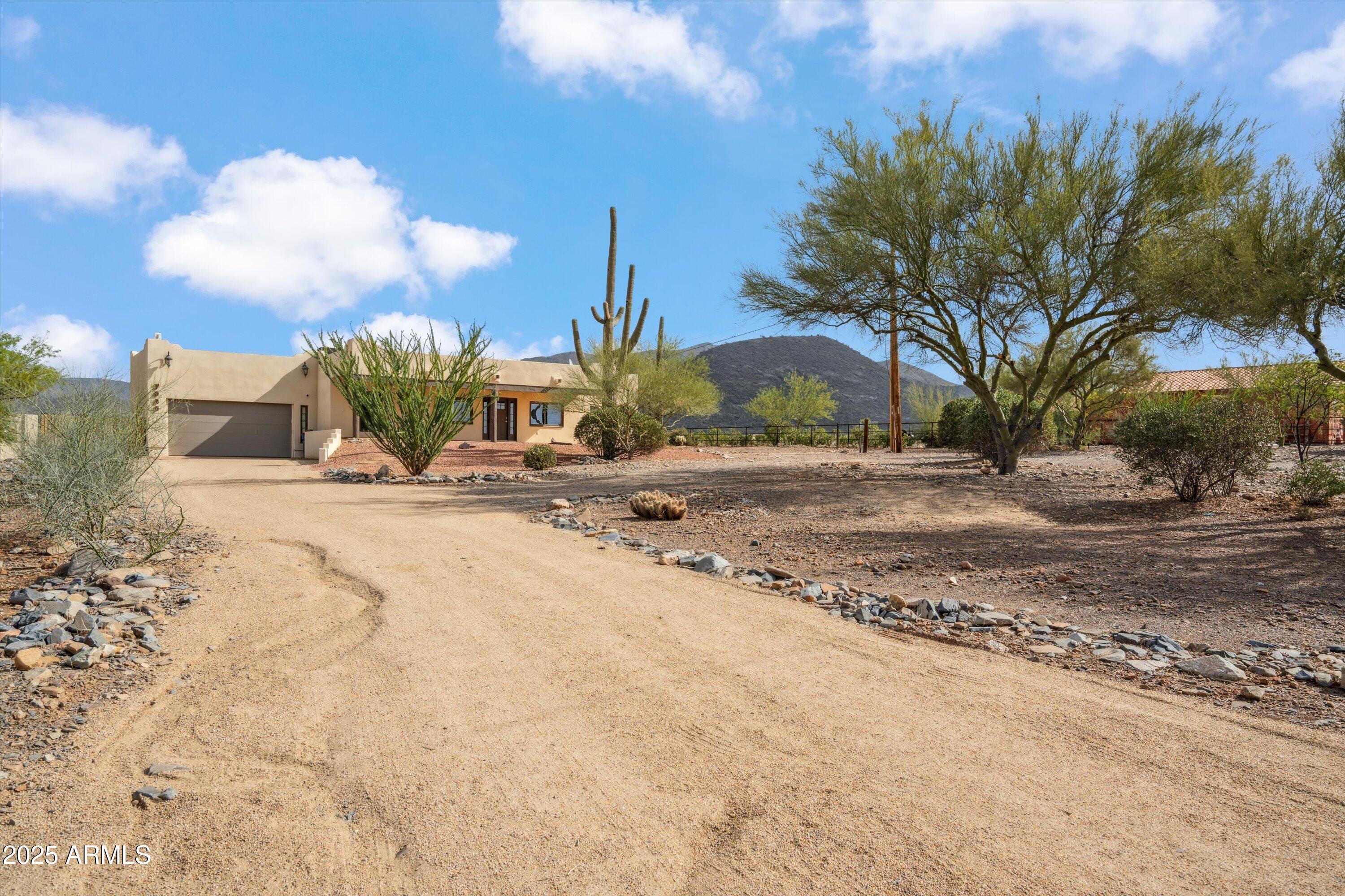 7080 East Arroyo Road Cave Creek, AZ 85331 - Photo 2 of 50 a view of a backyard of a house