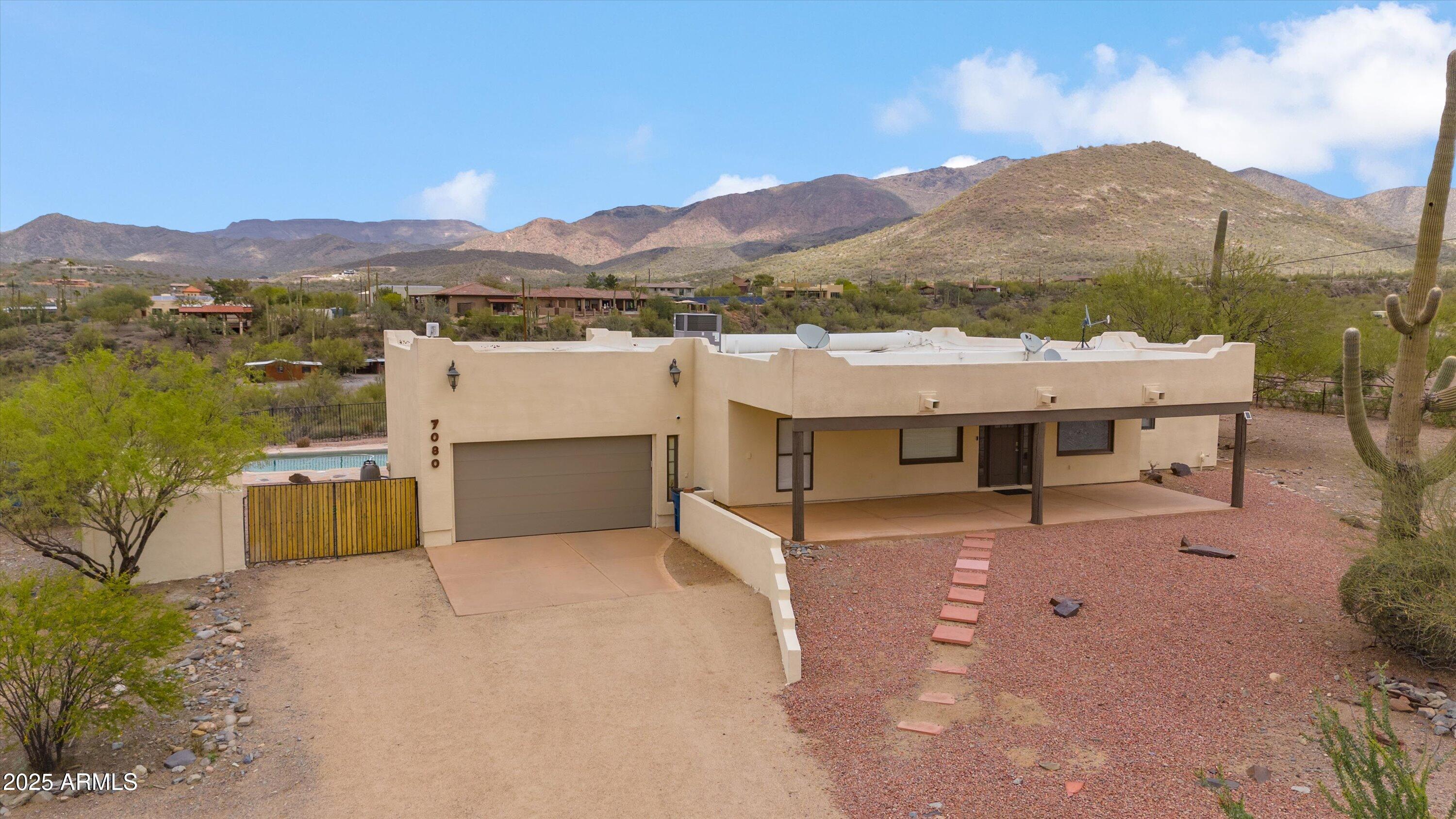 7080 East Arroyo Road Cave Creek, AZ 85331 - Photo 42 of 50 a view of a terrace with a mountain