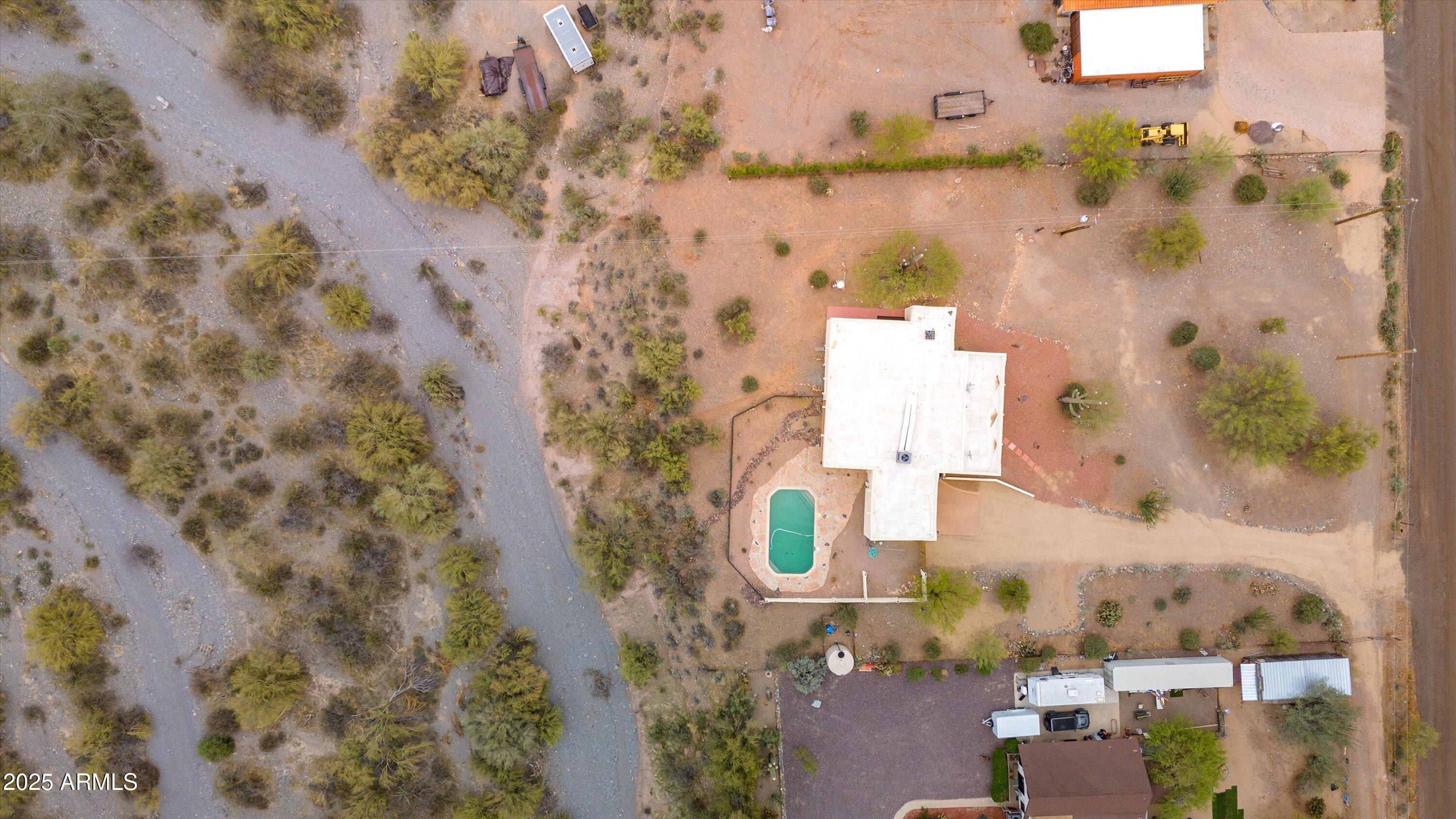 7080 East Arroyo Road Cave Creek, AZ 85331 - Photo 43 of 50 an aerial view of residential houses with outdoor space