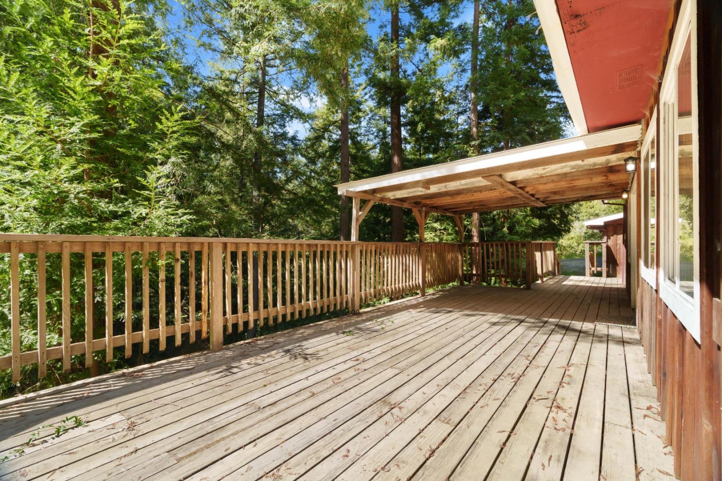 2950 Bear Canyon Road Los Gatos, CA 95033 - Photo 34 of 100 a view of backyard with a deck and wooden floor