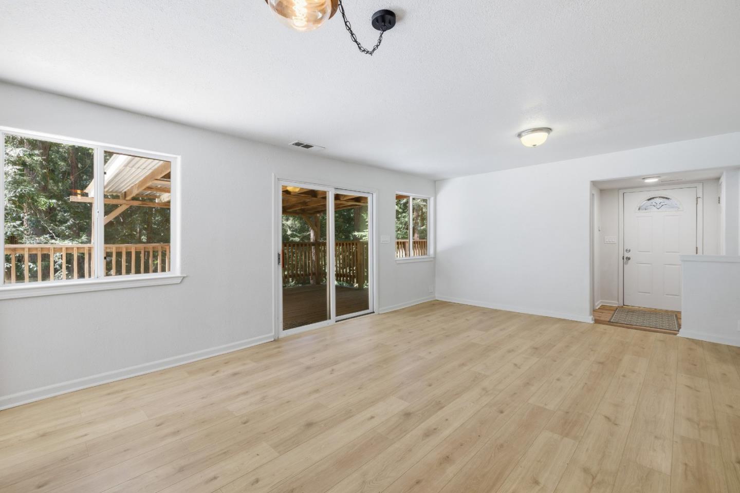 2950 Bear Canyon Road Los Gatos, CA 95033 - Photo 4 of 100 a view of an empty room with a window