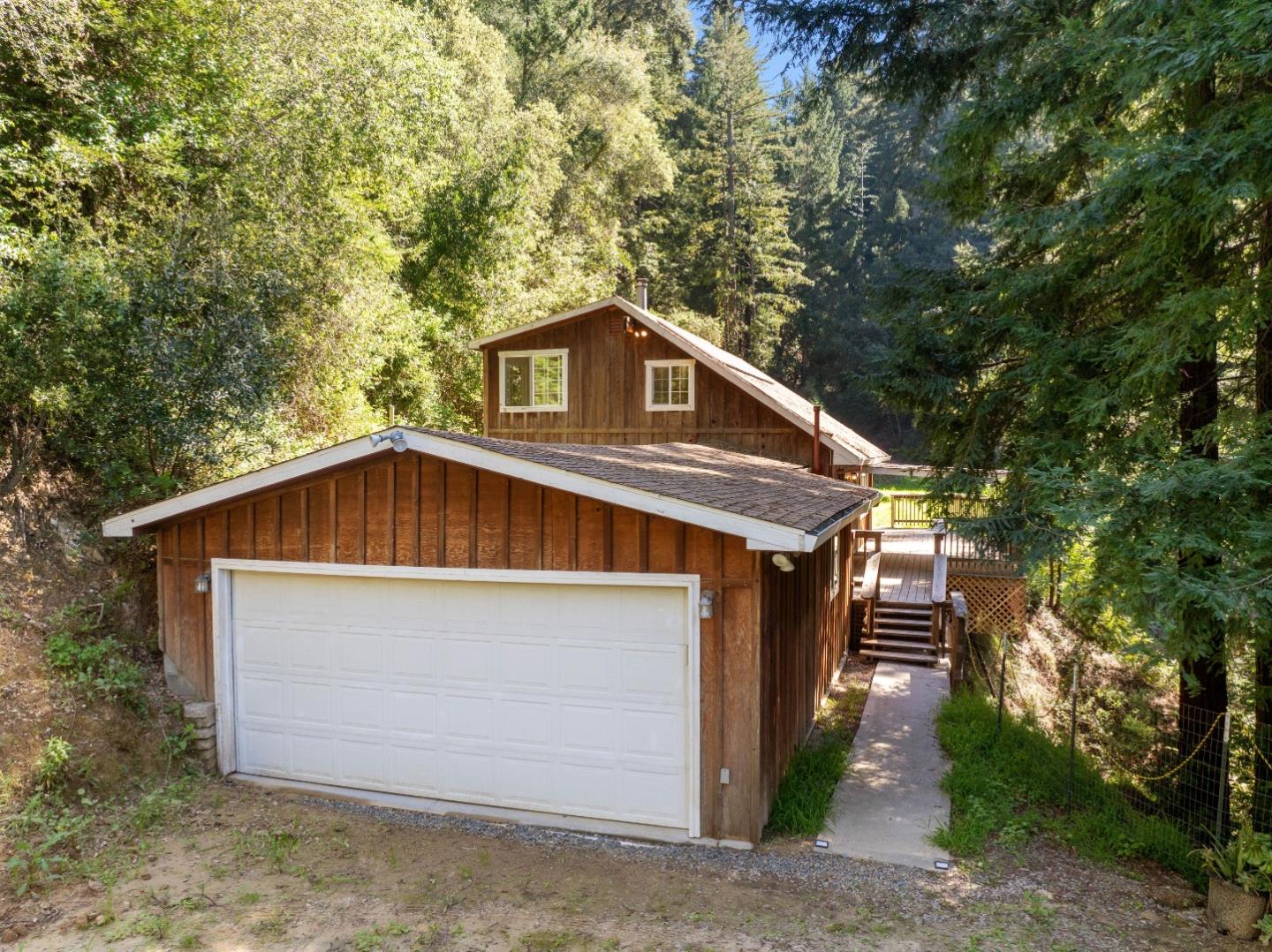 2950 Bear Canyon Road Los Gatos, CA 95033 - Photo 59 of 100 a front view of a house with a yard