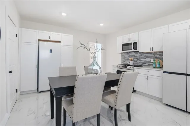 $325,000 | 216 Main Street, Wellsville, KS 66092