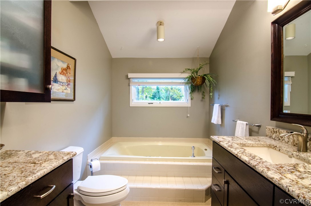 13810 Sterlings Bridge Road Midlothian, VA 23112 - Photo 19 of 38 a bathroom with a granite countertop toilet sink and bathtub