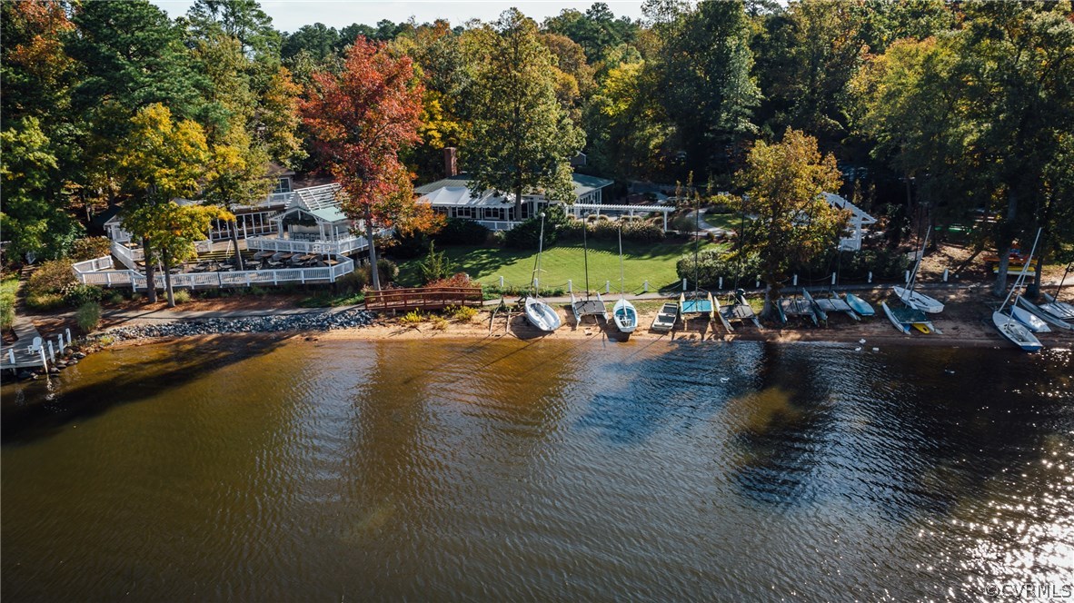 13810 Sterlings Bridge Road Midlothian, VA 23112 - Photo 35 of 38 a view of a lake with a table and chairs