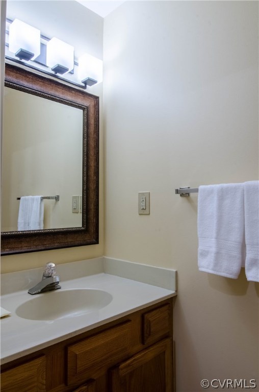 13810 Sterlings Bridge Road Midlothian, VA 23112 - Photo 6 of 38 a bathroom with a sink and a mirror