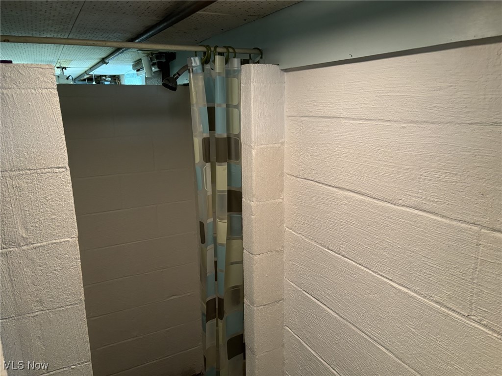 12060 West Sprague Road Parma, OH 44130 - Photo 26 of 30 A concrete-block shower in the basement.