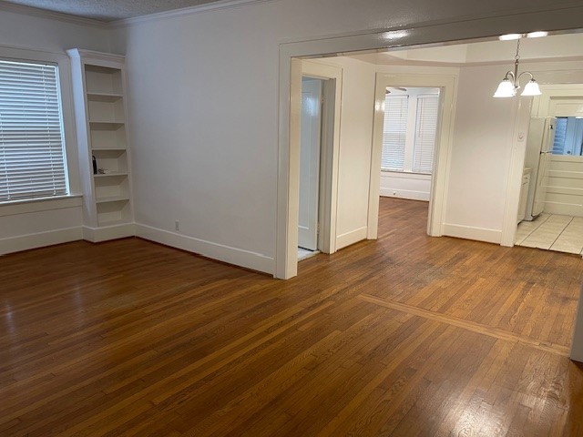 1661 Kipling Street, Unit 2 Houston, TX 77006 - Photo 3 of 10 a view of a room with wooden floor and entryway