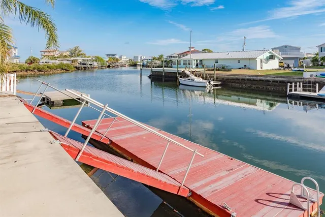 an aerial view of a house with outdoor space