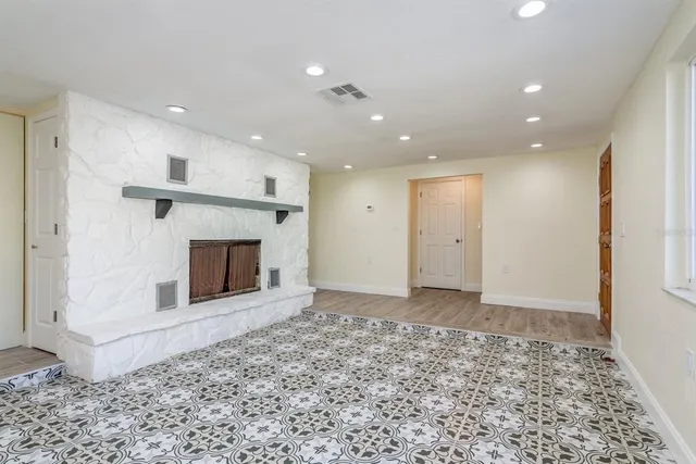 a view of a livingroom with a fireplace