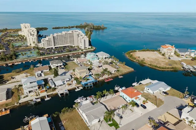 a picture of city view with lake view and boat