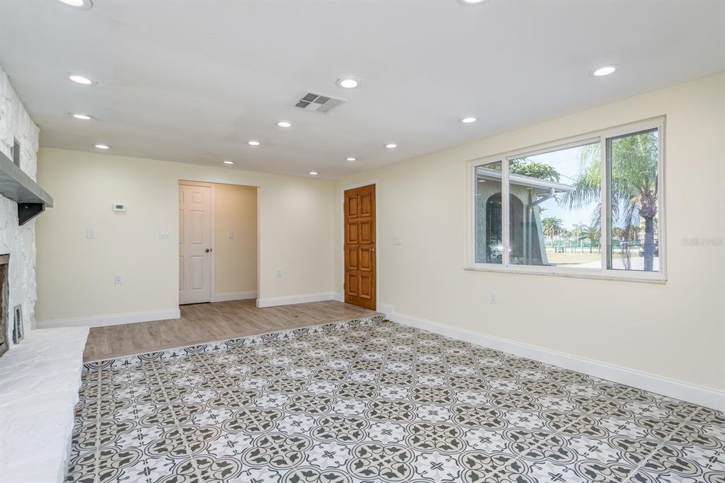 13816 Celida Avenue Hudson, FL 34667 - Photo 4 of 42 a view of an empty room with a window
