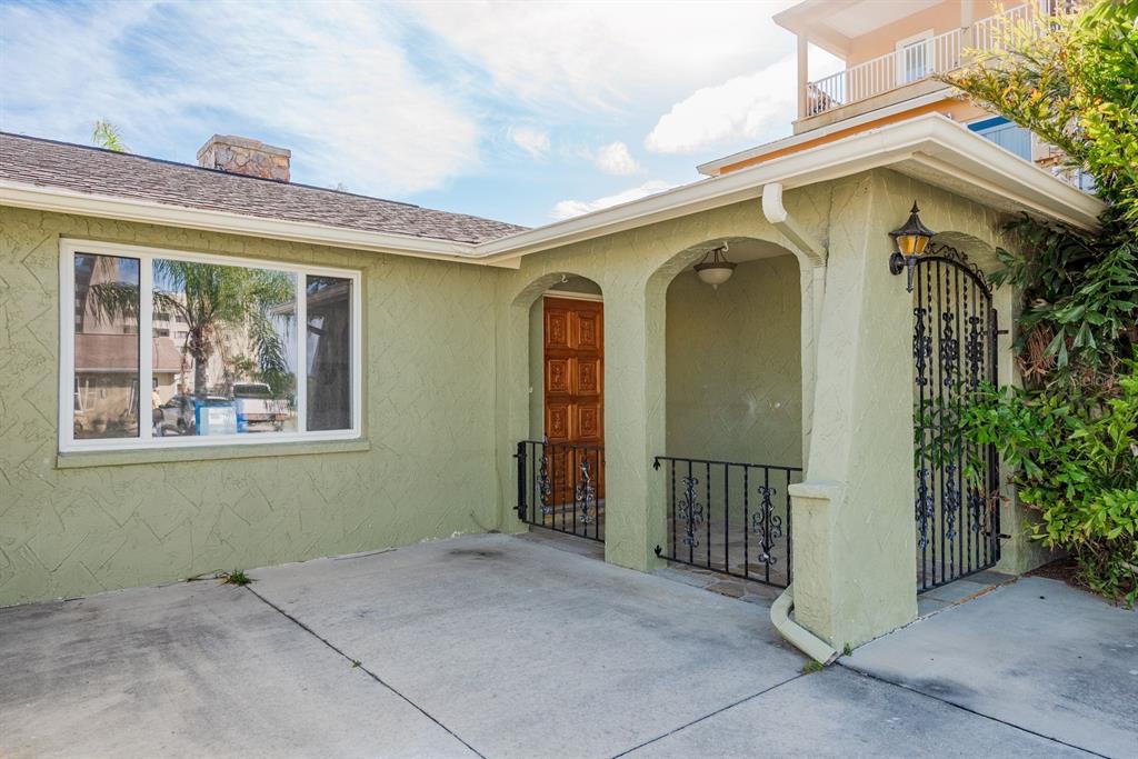 13816 Celida Avenue Hudson, FL 34667 - Photo 41 of 42 a front view of a house with a porch