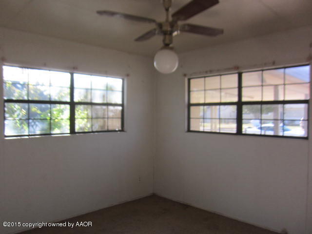 5101 South Bonham Street Amarillo, TX 79110 - Photo 7 of 12 an empty room with a window
