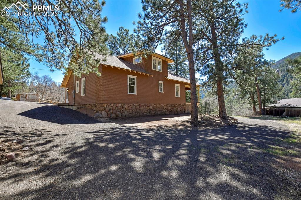 4530 Hagerman Road Cascade, CO 80809 - Photo 39 of 47 Back Of Home With View Of The Mountains
