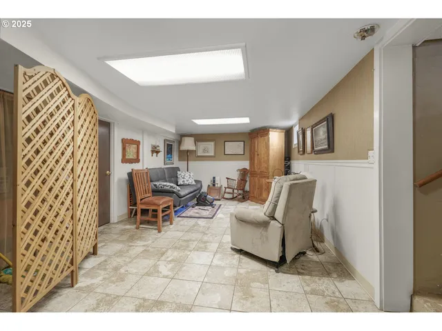 a living room with furniture and a couch