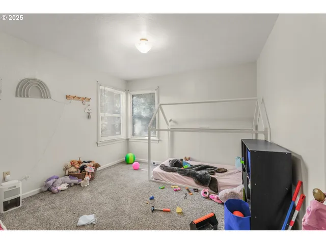 a bathroom with a sink mirror and a shower