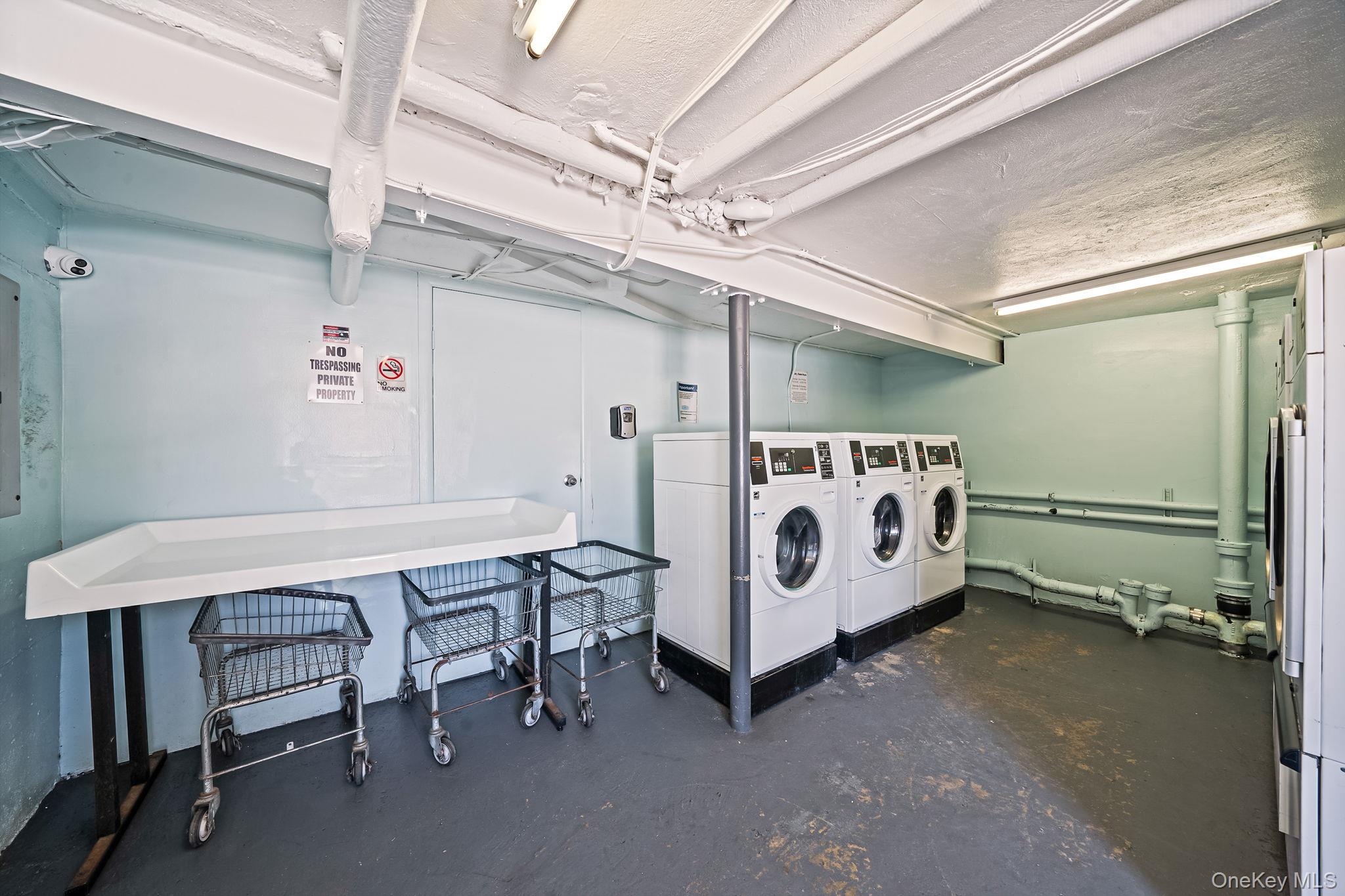 224-24 Manor Road, Unit UPPR Queens, NY 11427 - Photo 23 of 25 a utility room with a table and chairs