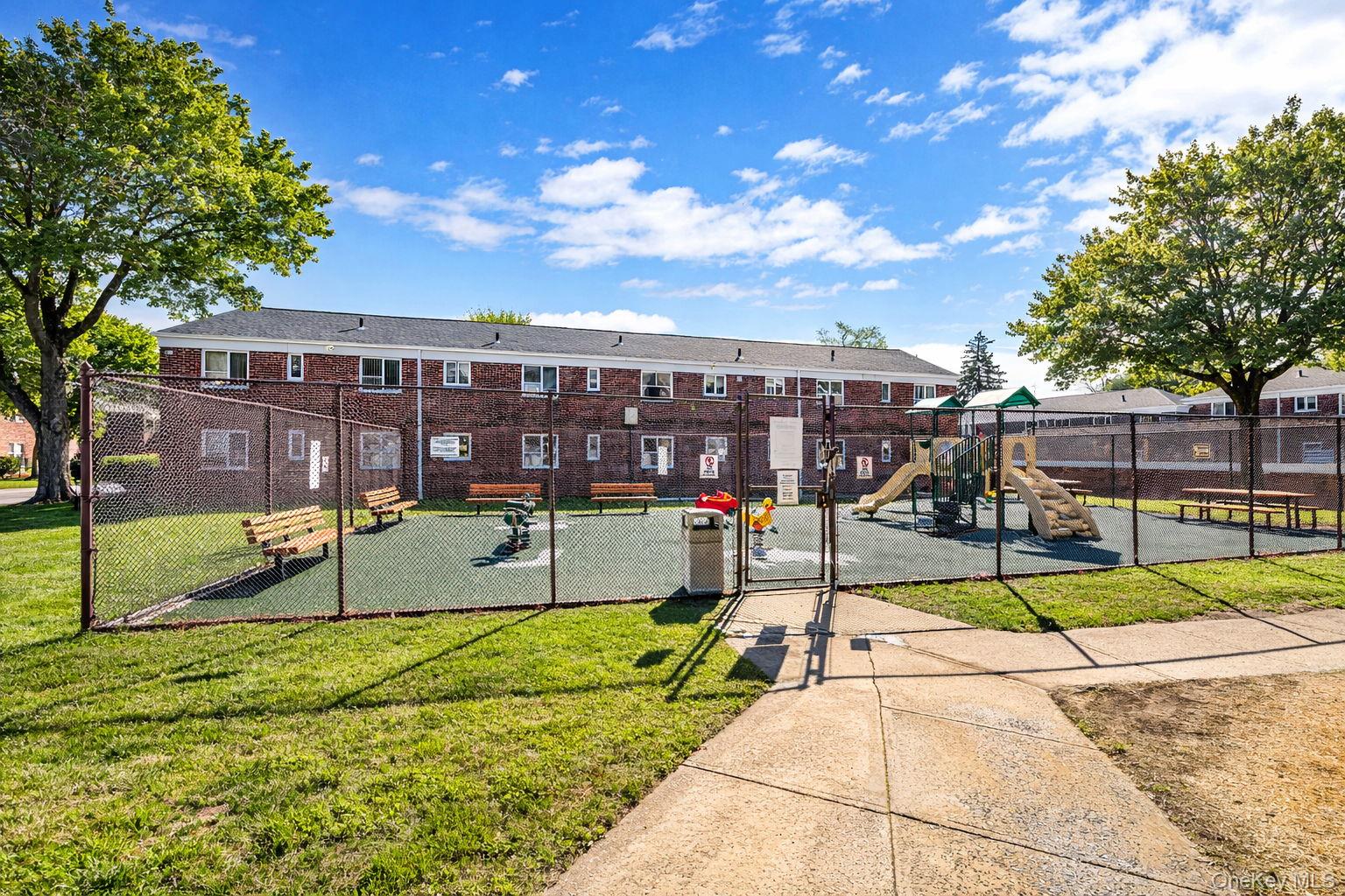 224-24 Manor Road, Unit UPPR Queens, NY 11427 - Photo 6 of 25 a view of a park with iron fence