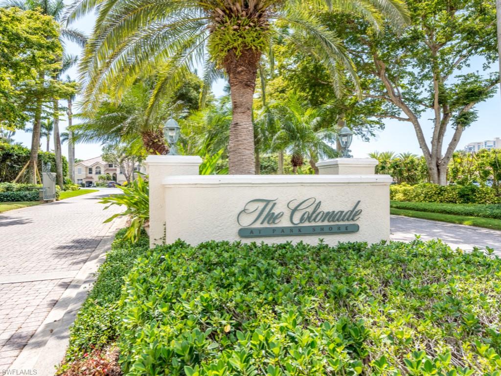 166 Colonade Circle Naples, FL 34103 - Photo 21 of 27 a sign on the side of the road