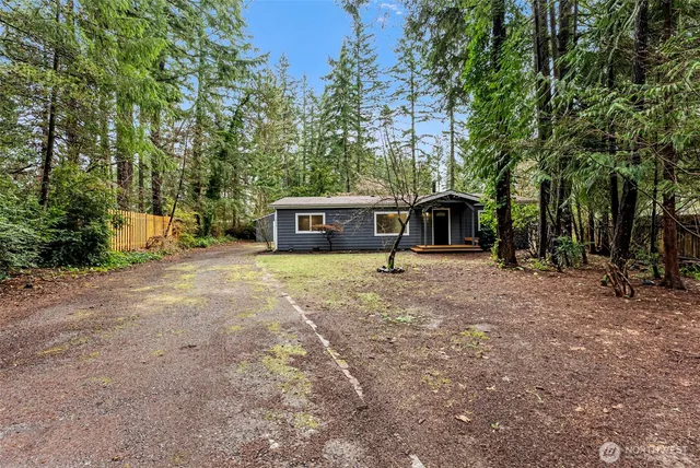 a house view with a backyard space