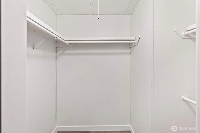 a view of an empty walk in closet