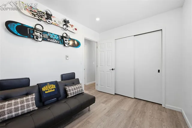 a view of living room with furniture and rug