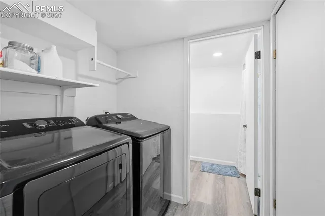 a utility room with dryer and washer