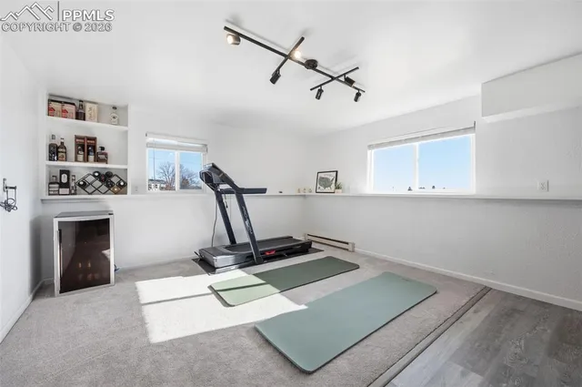 a view of a room with gym equipment