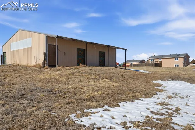 a large house with a backyard
