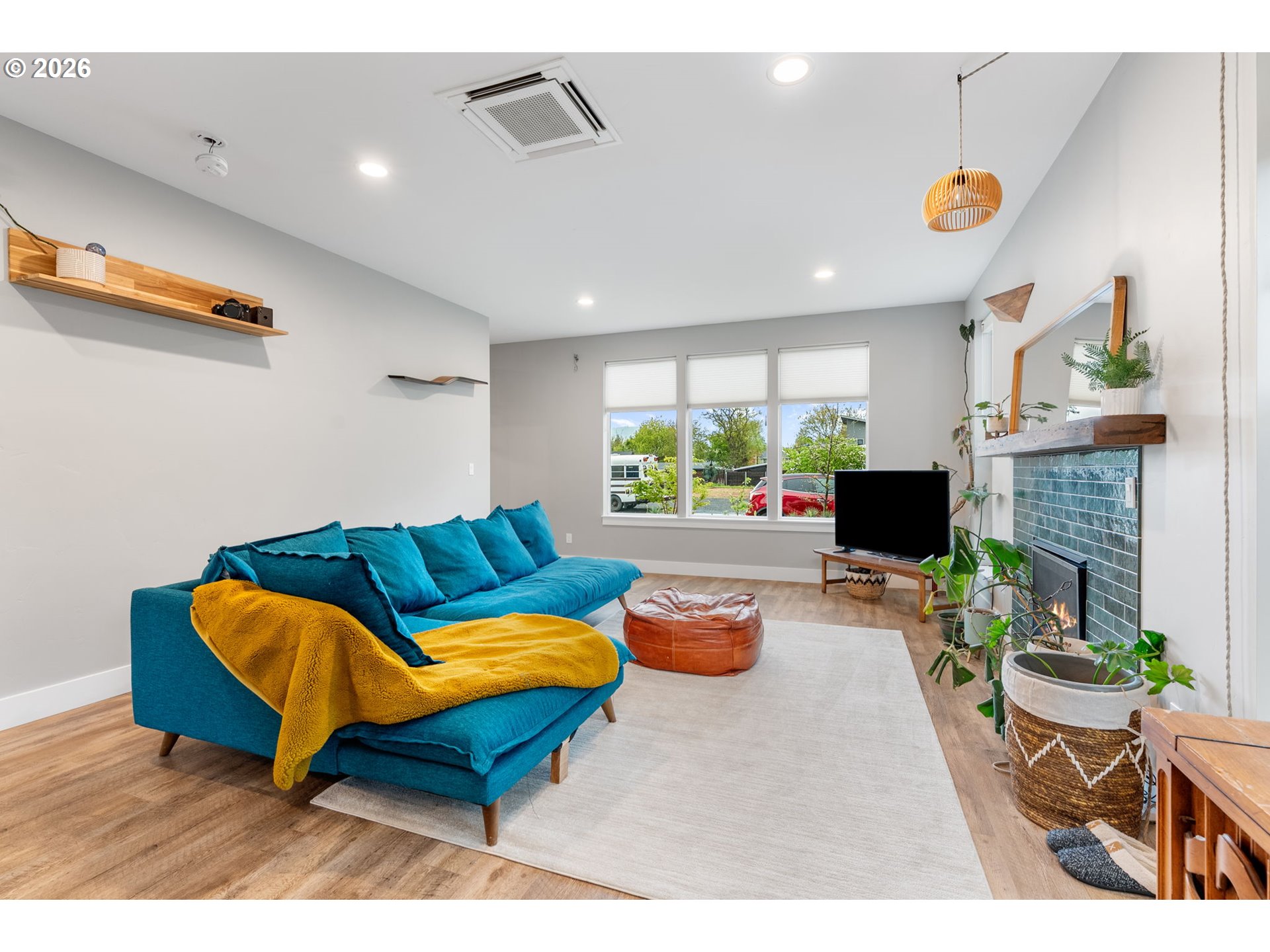 1114 9th Street Hood River, OR 97031 - Photo 17 of 48 a living room with furniture and a fireplace