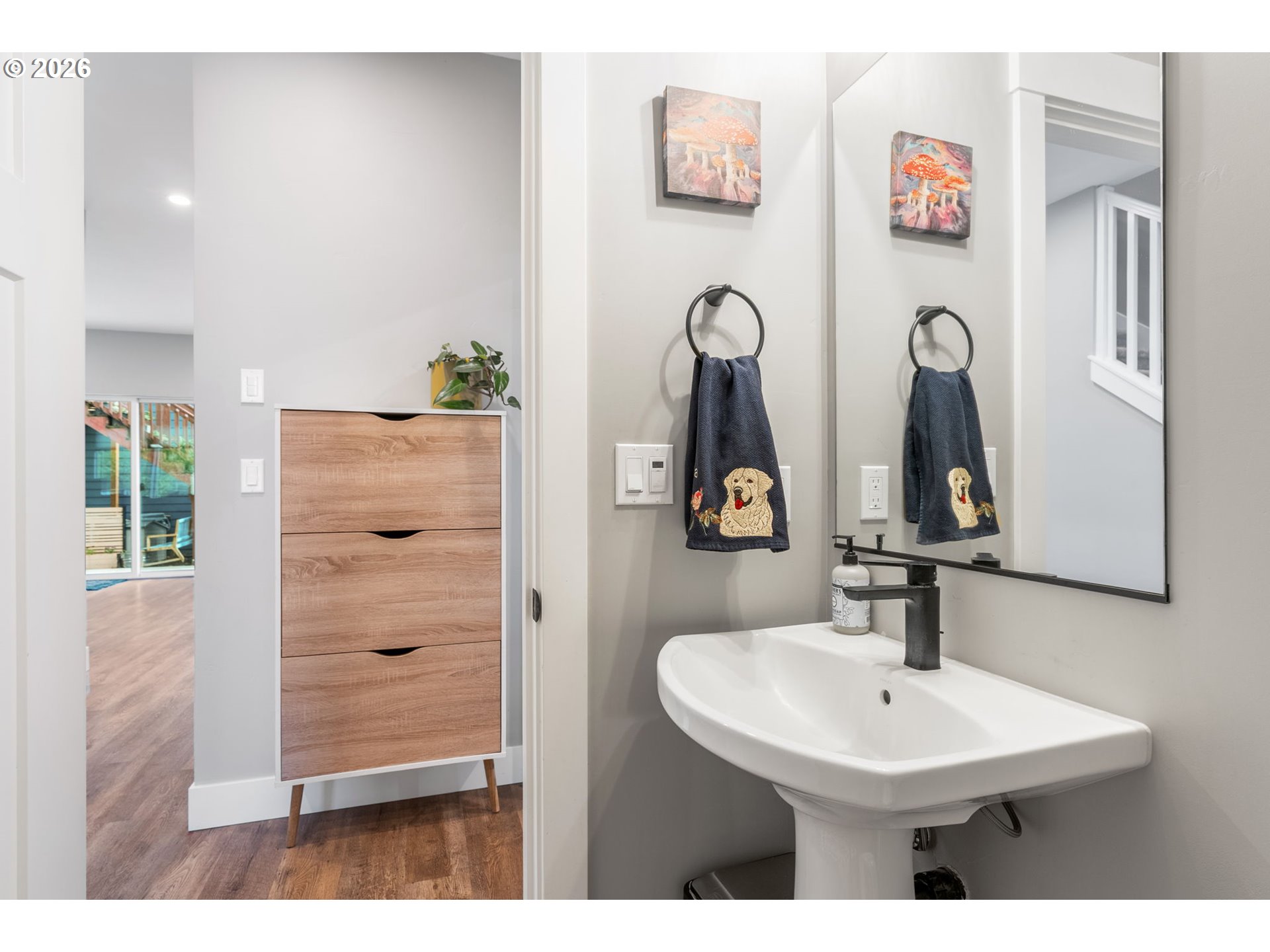 1114 9th Street Hood River, OR 97031 - Photo 20 of 48 a bathroom with a sink a mirror and a window
