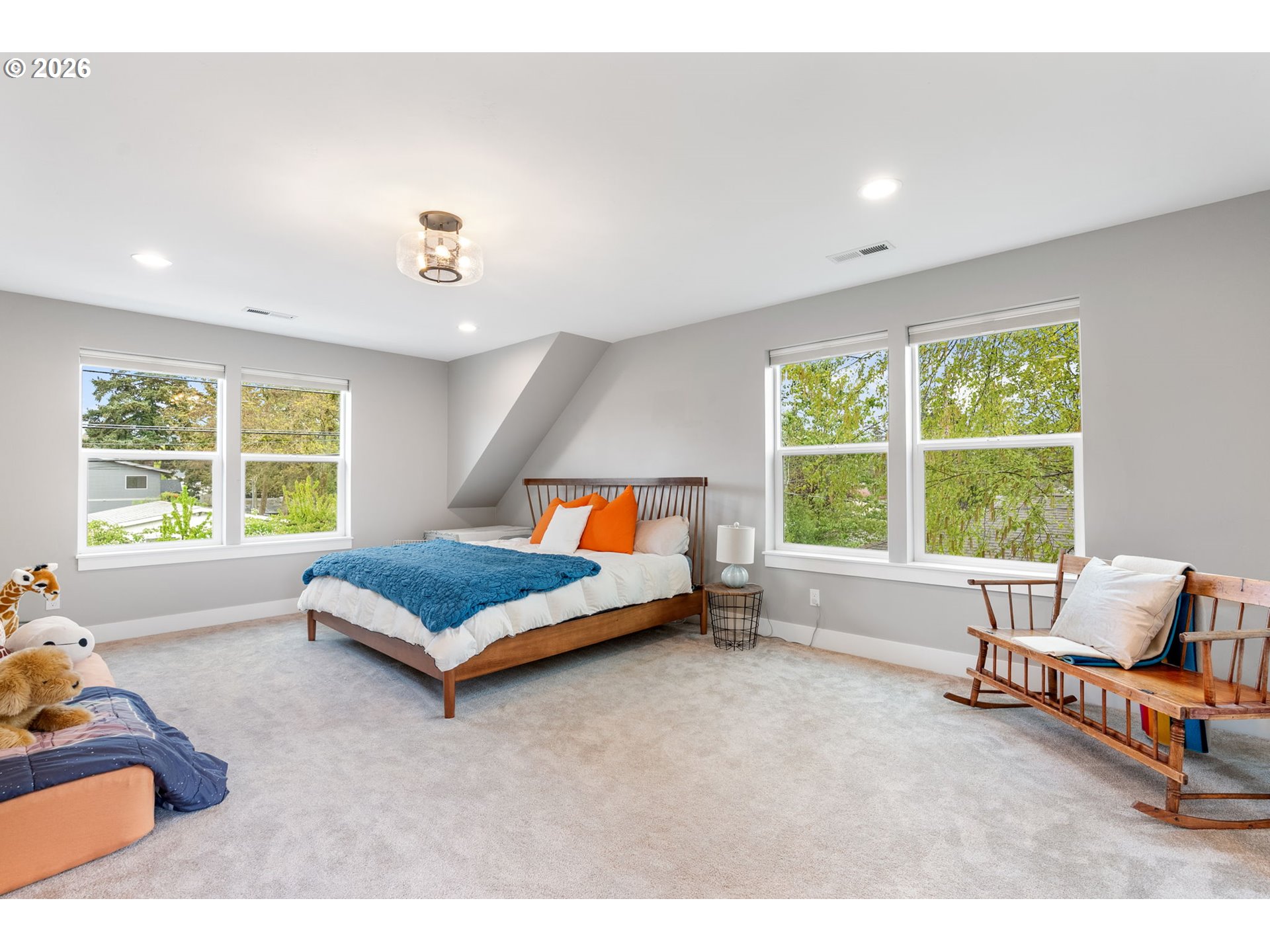 1114 9th Street Hood River, OR 97031 - Photo 22 of 48 a bedroom with furniture and a large window