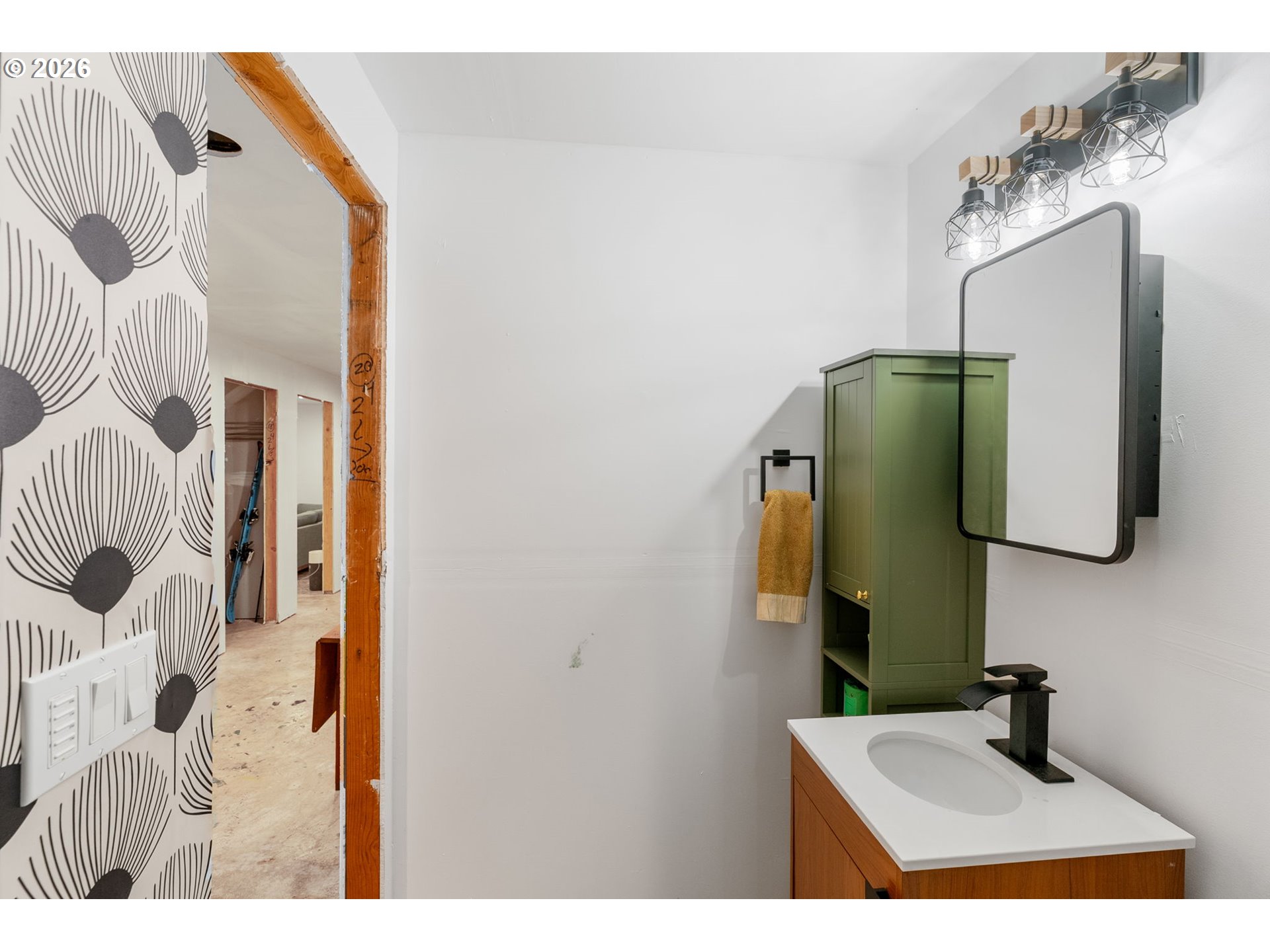 1114 9th Street Hood River, OR 97031 - Photo 36 of 48 a bathroom with a sink and mirror