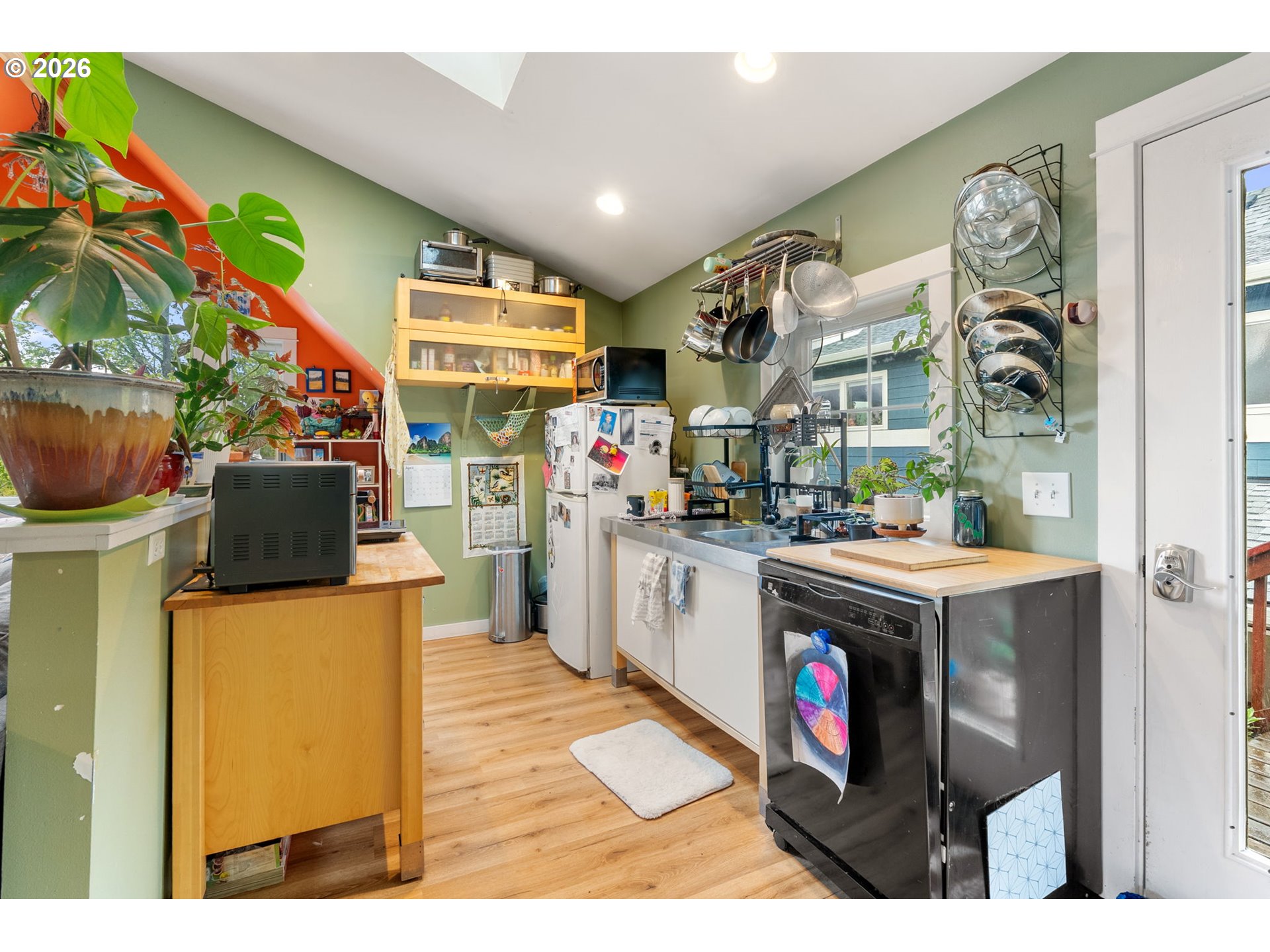 1114 9th Street Hood River, OR 97031 - Photo 40 of 48 a kitchen with a stove and a refrigerator