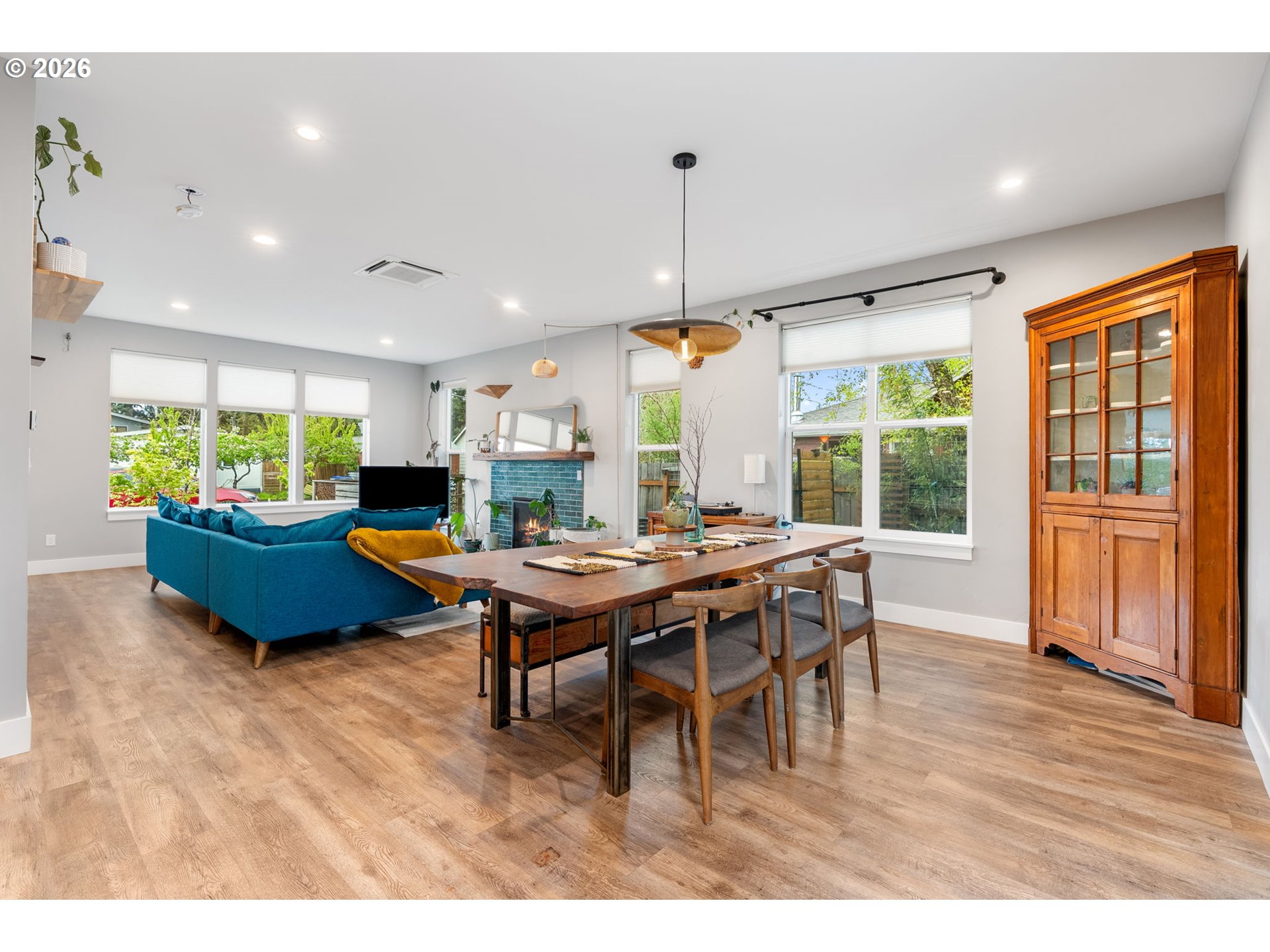 1114 9th Street Hood River, OR 97031 - Photo 7 of 48 a living room with furniture a window and a table