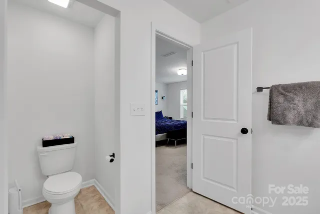 a en suite bathroom with a toilet