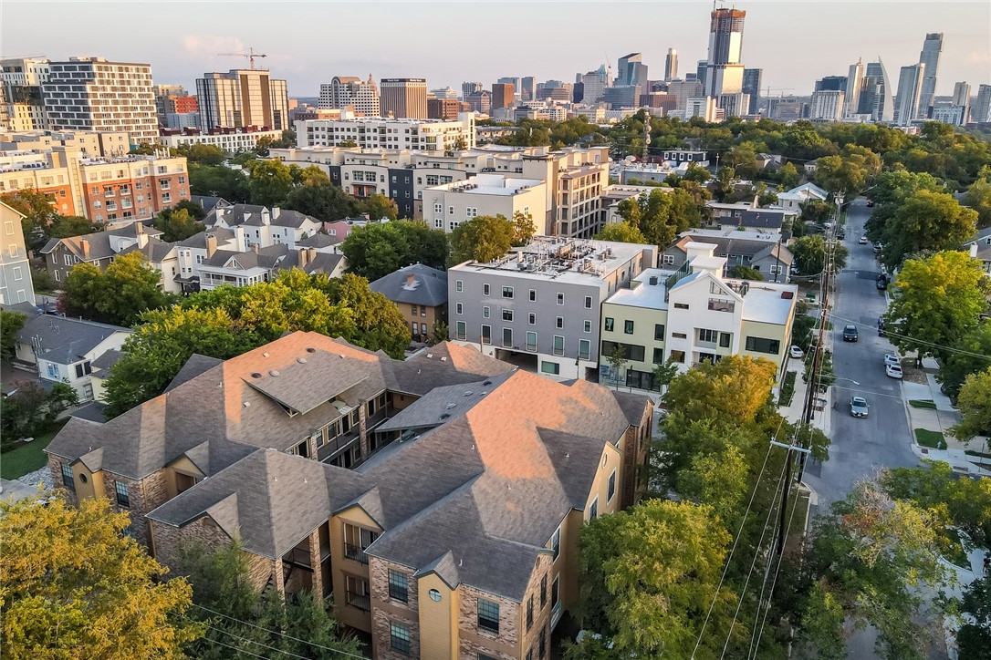 an aerial view of a city with lots of residential buildings