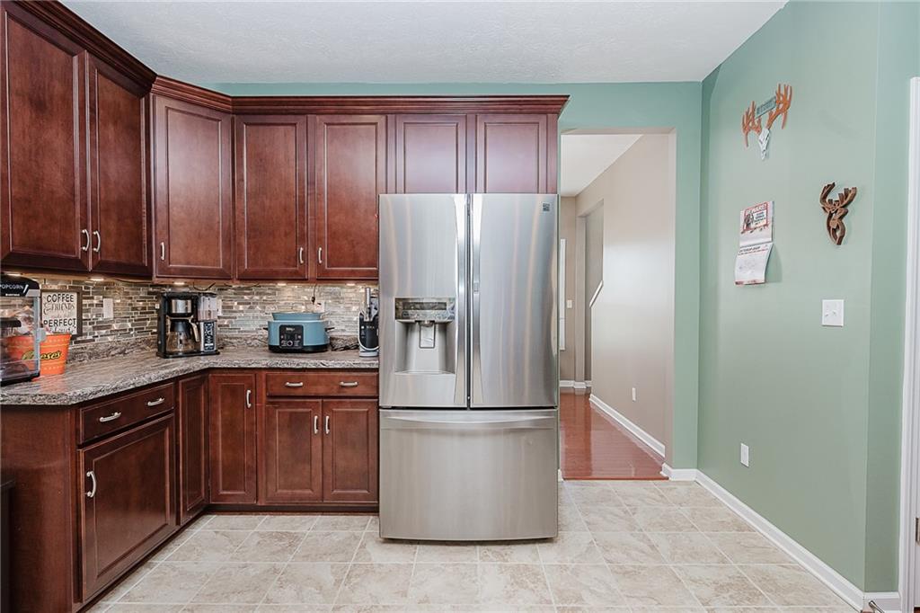 2831 Rte 286 Highway East Indiana, PA 15701 - Photo 11 of 40 a kitchen with a refrigerator sink and cabinets