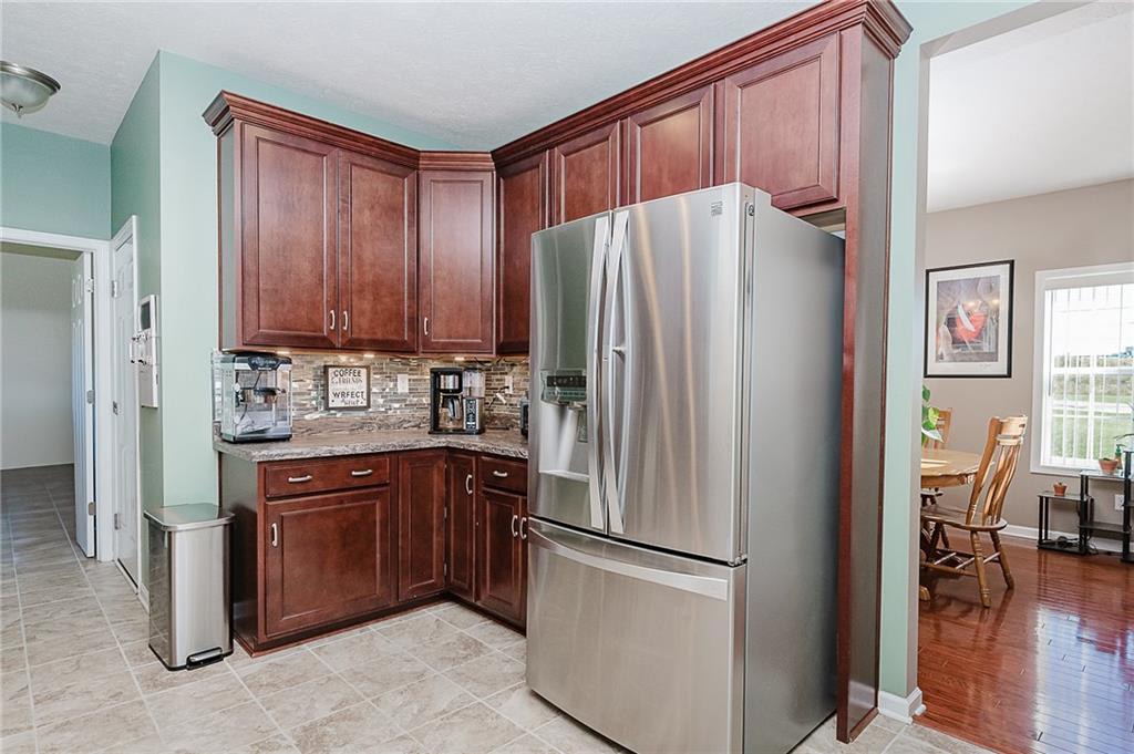 2831 Rte 286 Highway East Indiana, PA 15701 - Photo 12 of 40 a kitchen with stainless steel appliances granite countertop a refrigerator and a stove top oven