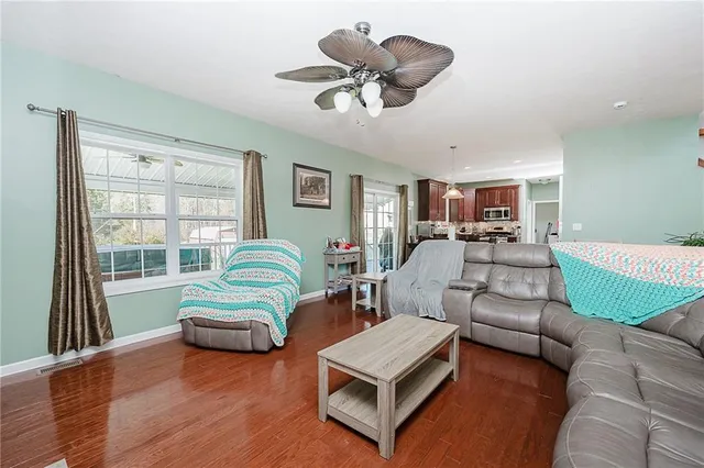 a bedroom with a bed and furniture