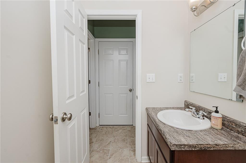 2831 Rte 286 Highway East Indiana, PA 15701 - Photo 26 of 40 a bathroom with a granite countertop sink and a mirror