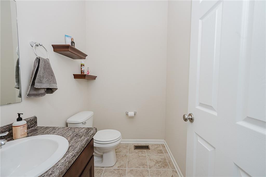 2831 Rte 286 Highway East Indiana, PA 15701 - Photo 27 of 40 a bathroom with a granite countertop sink toilet and a mirror