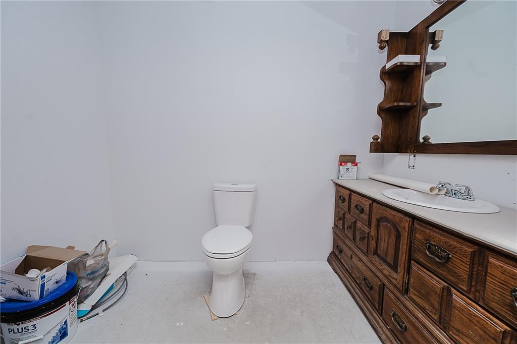 2831 Rte 286 Highway East Indiana, PA 15701 - Photo 28 of 40 a bathroom with a sink a toilet and a mirror