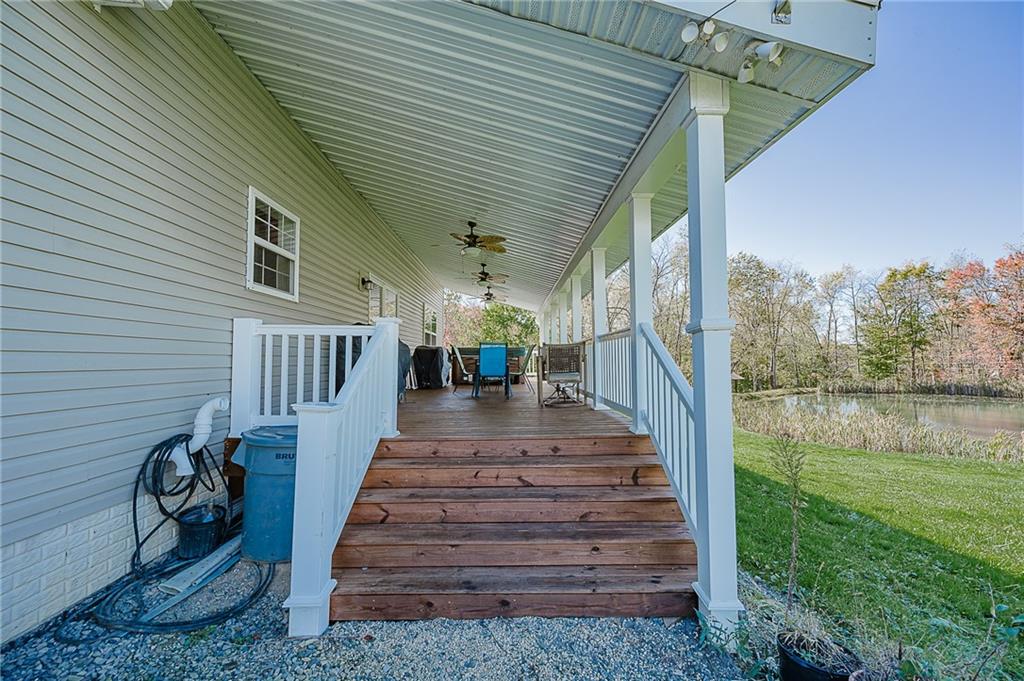 2831 Rte 286 Highway East Indiana, PA 15701 - Photo 36 of 40 a view of a patio with a table chairs and wooden fence
