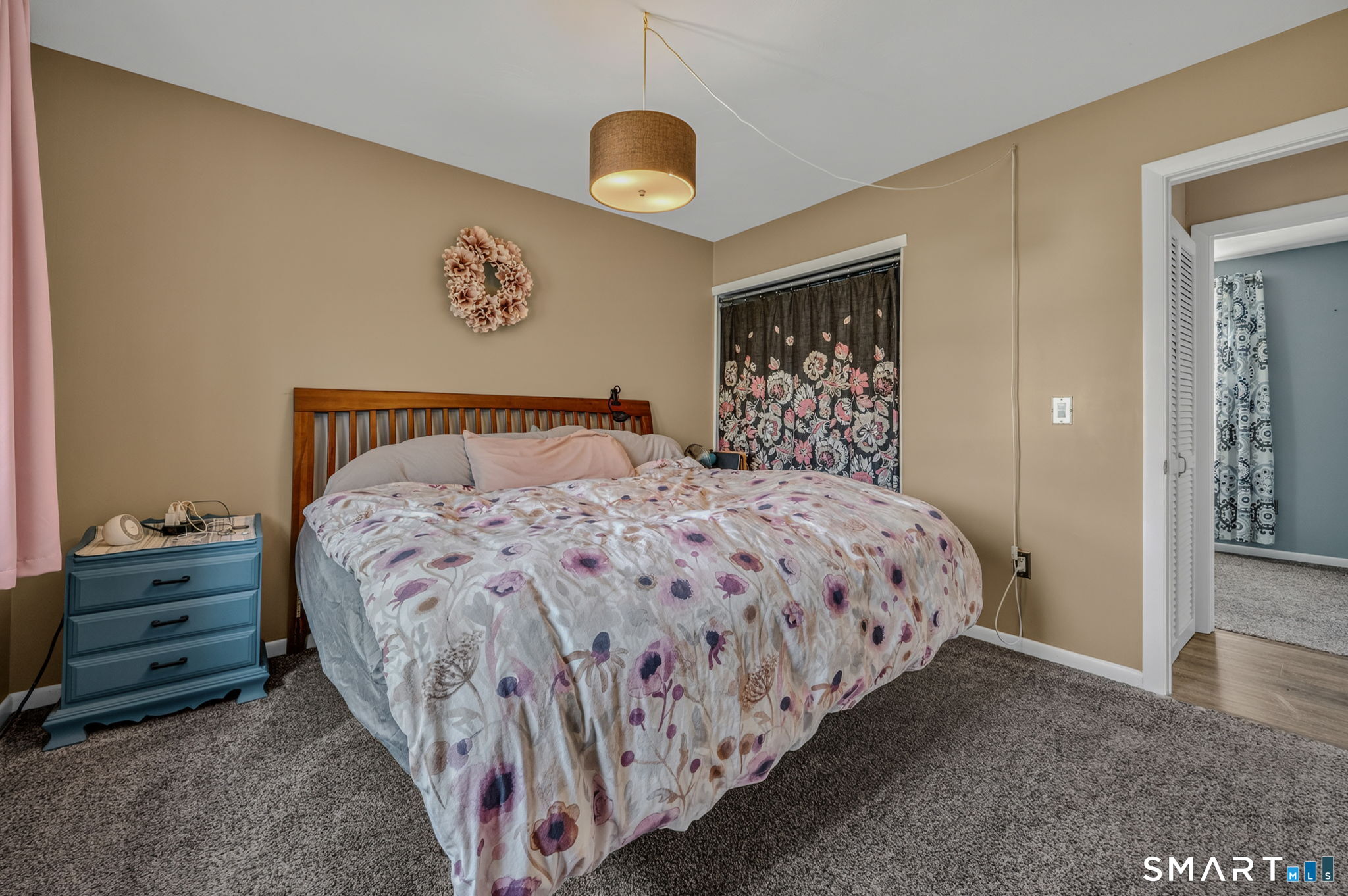 194 Browning Road Norwich, CT 06360 - Photo 15 of 38 a large bed sitting in a bedroom next to a cabinet