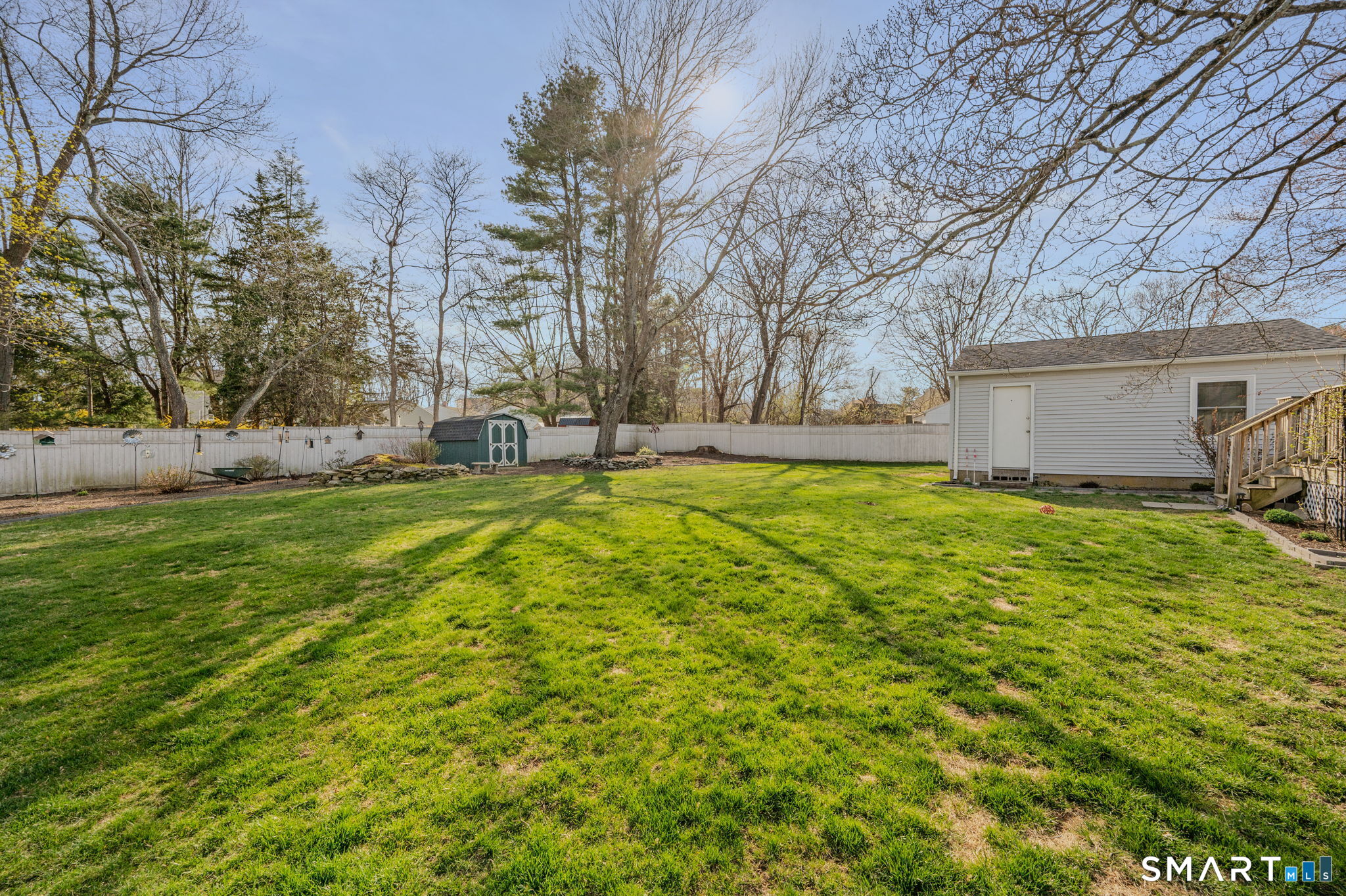194 Browning Road Norwich, CT 06360 - Photo 23 of 38 a view of a backyard with large trees