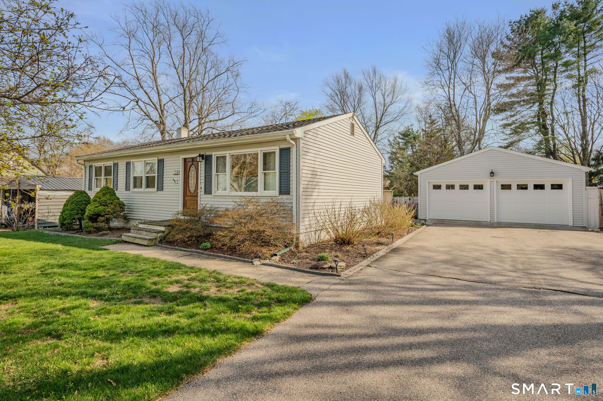 194 Browning Road Norwich, CT 06360 - Photo 3 of 38 a front view of a house with garden