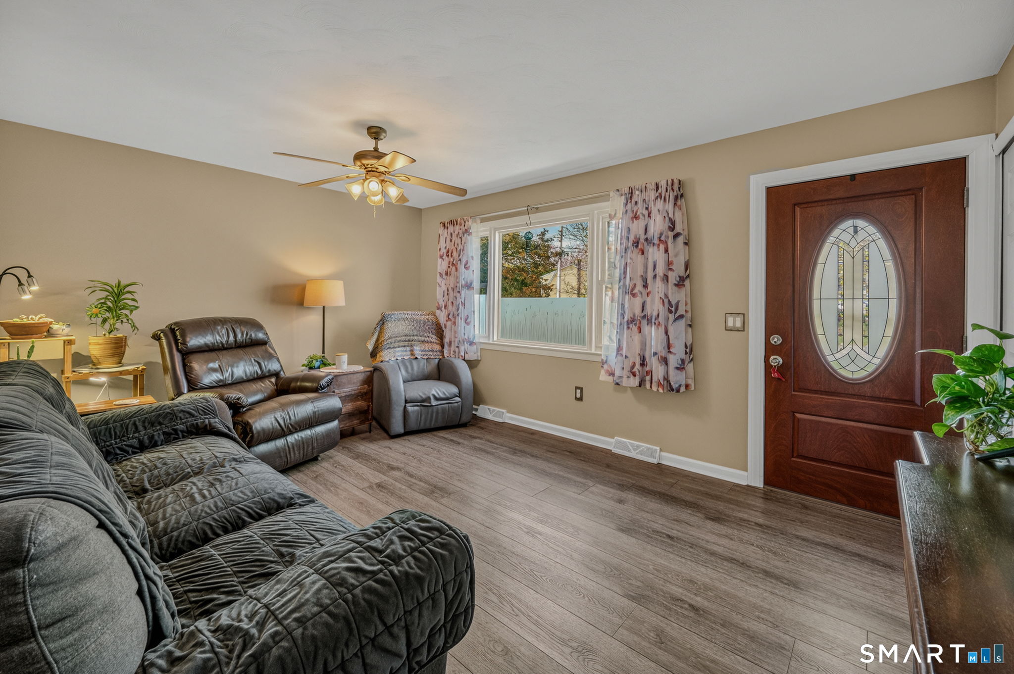 194 Browning Road Norwich, CT 06360 - Photo 8 of 38 a spacious bedroom with a bed couch and a window
